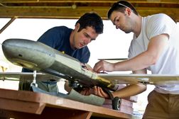 Students assemble a model plane